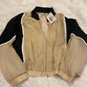 Zyia Tan and Black block zipper jacket